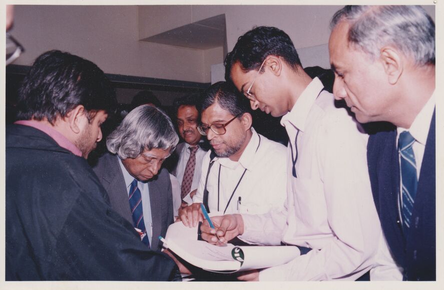 Dr A P J Abdul Kalam, President of India from 25 July 2002 to 25 July 2007, autographing my copy of his autobiography, Wings of Fire, at the BioVision 2001 conference in Bangalore, India, in December 2001, at which he delivered the keynote address.